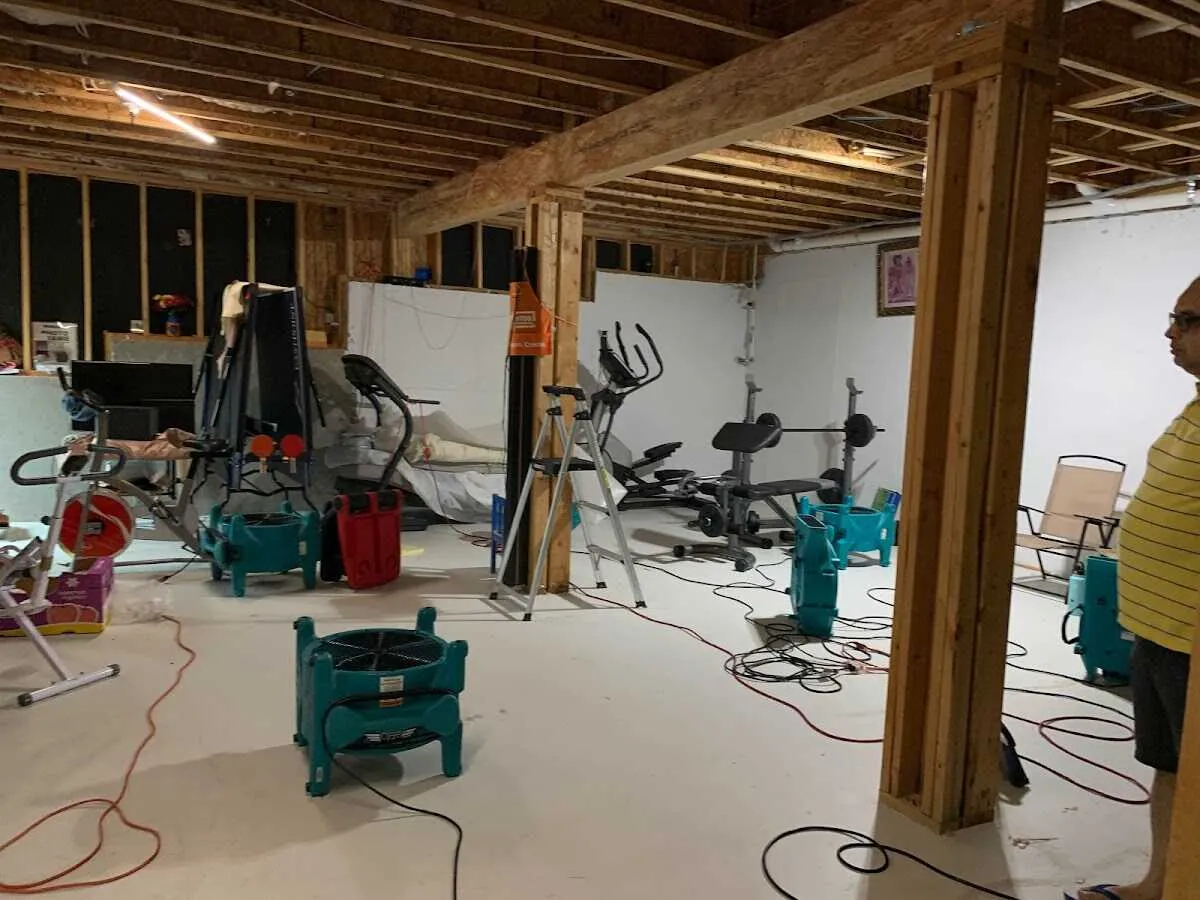 Basement drying equipment setup for Contents Cleaning & Restoration in Elbridge